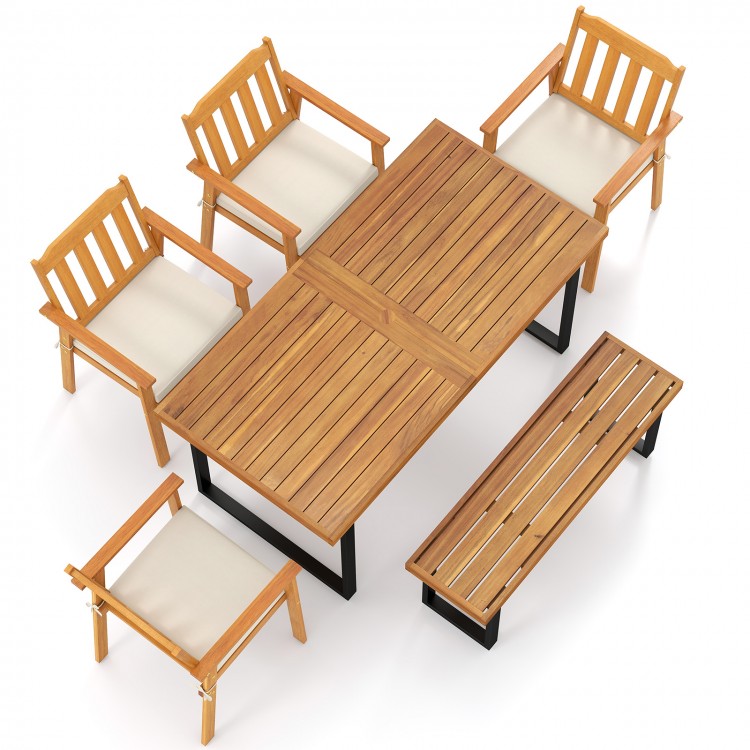 Top view of a 63” rectangular patio dining table set with four acacia wood armchairs and a backless bench for outdoor.