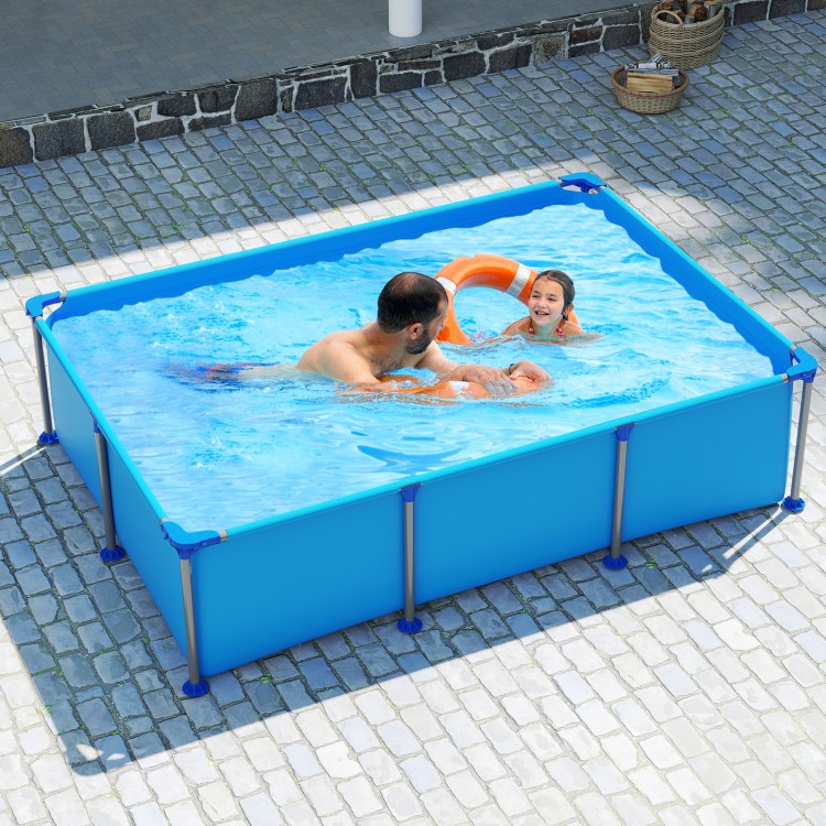 Family enjoying the 6 ft outdoor swimming pool with metal frame, featuring durable PVC fabric and easy drainage.