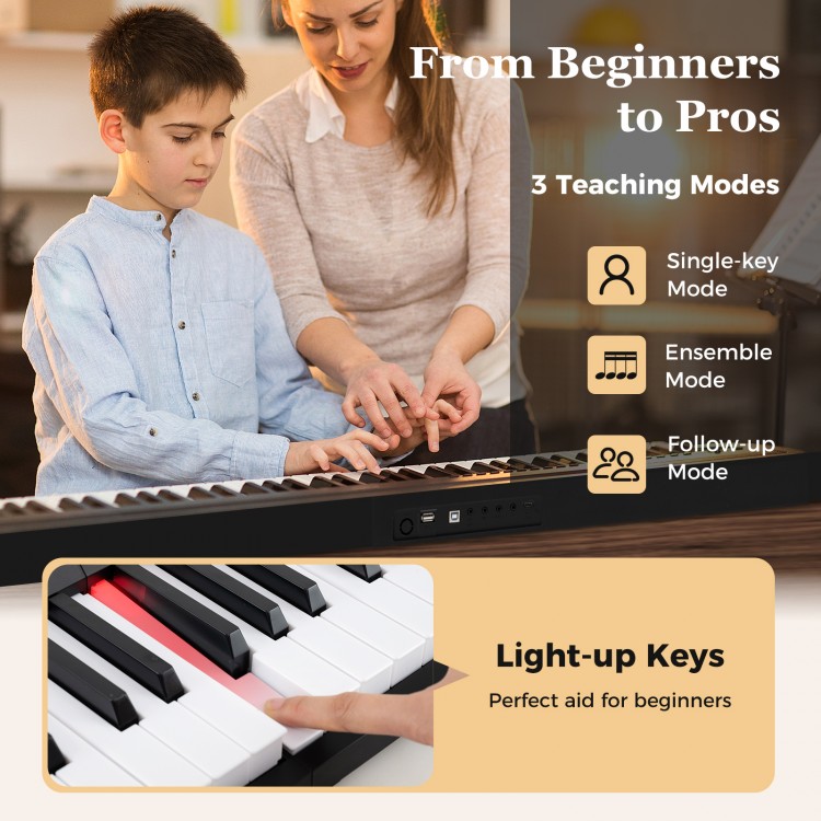 88-key foldable electric piano with light-up keys, perfect for beginners, featuring three teaching modes and portable.