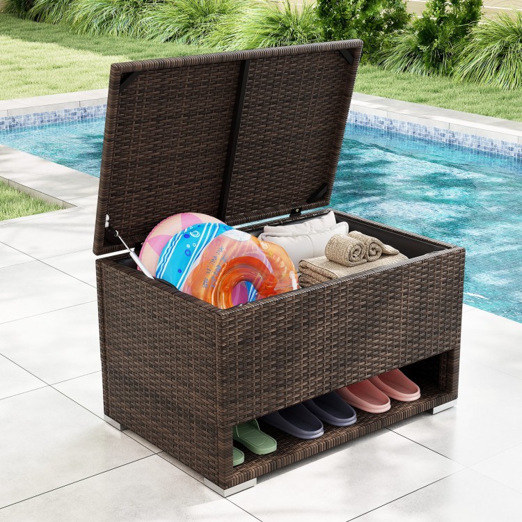 PE rattan storage bin with waterproof liner, featuring a large inner space and shoe rack, ideal for patio and poolside.