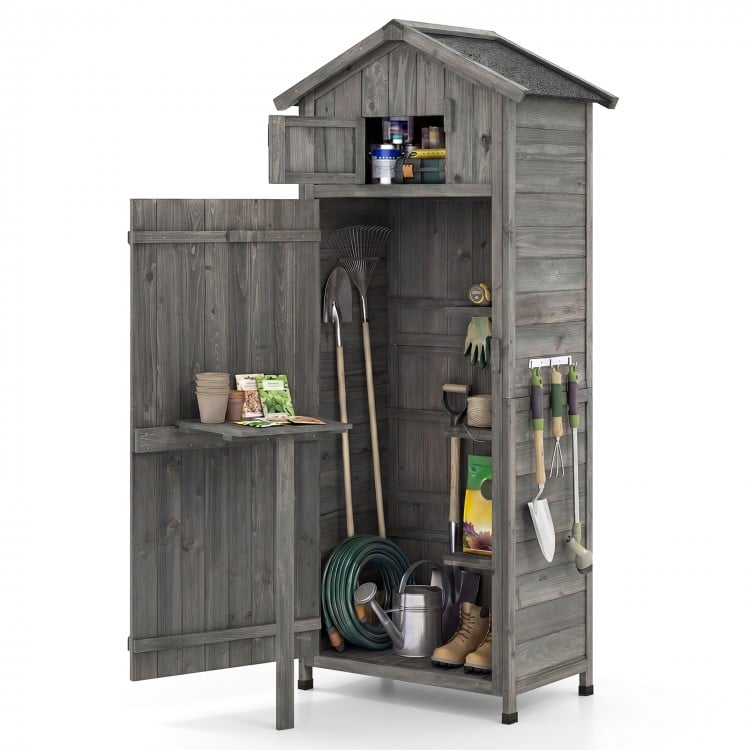 Garden tool storage cabinet with lockable doors, foldable table, and detachable shelves in grey for outdoor.