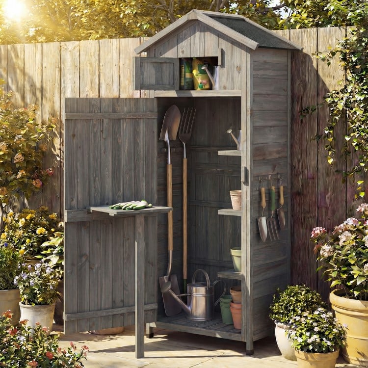 Garden tool storage cabinet with lockable doors, foldable table, and 3 shelves, made of durable grey fir wood for.