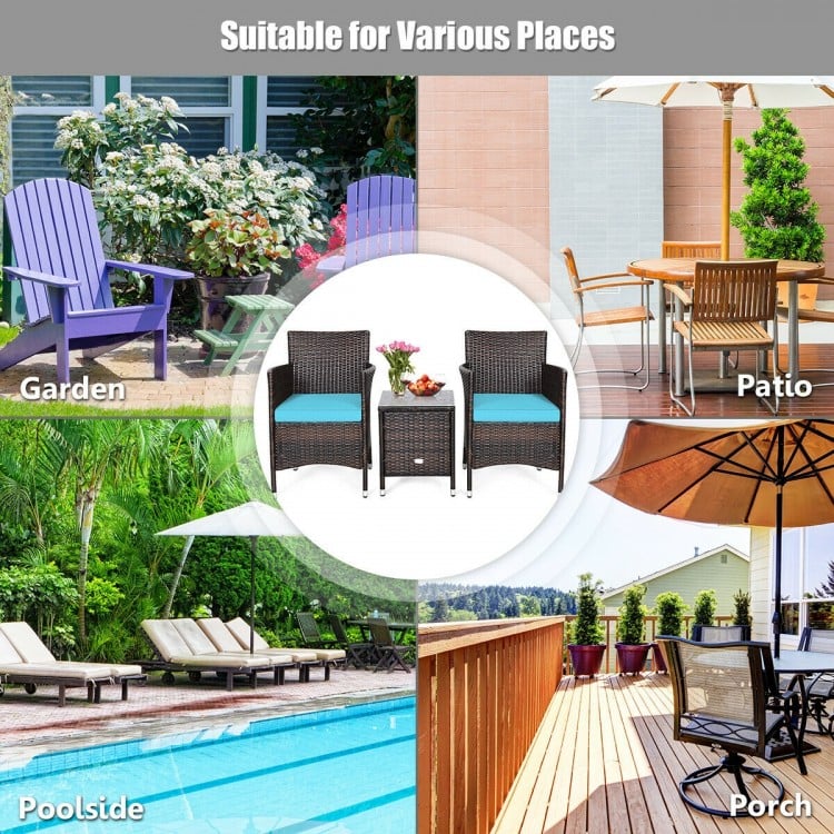 3-piece patio furniture set featuring two blue-cushioned rattan chairs and a tempered glass table for outdoor.