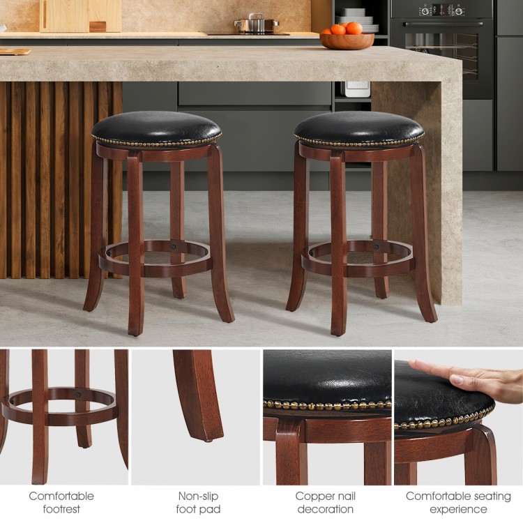 Backless swivel bar stool with padded PU leather seat, rubber wood legs, and footrest for comfortable kitchen seating.
