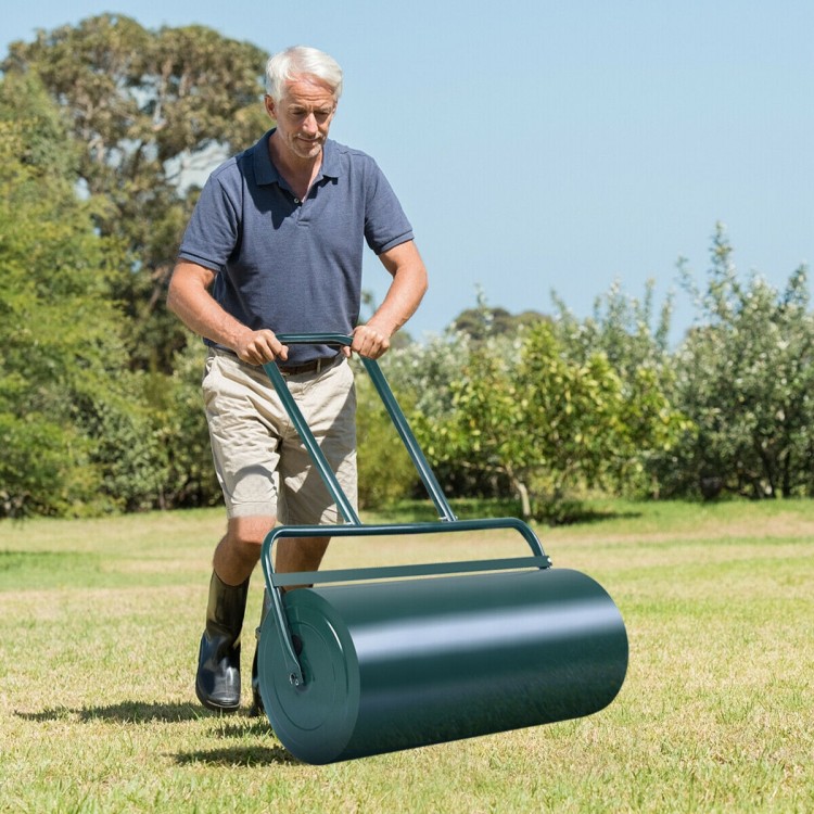 Green 24 x 13 inch metal push lawn roller with foldable handles, ideal for leveling and smoothing lawns.