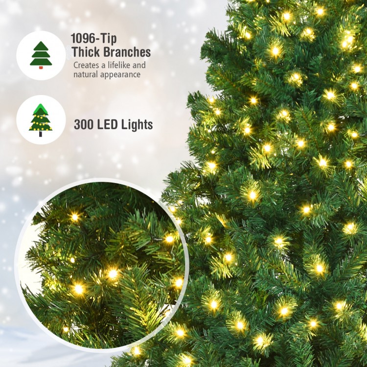Close-up of the 7-foot PVC artificial Christmas tree with 300 pre-lit LED lights, featuring thick branches for a.