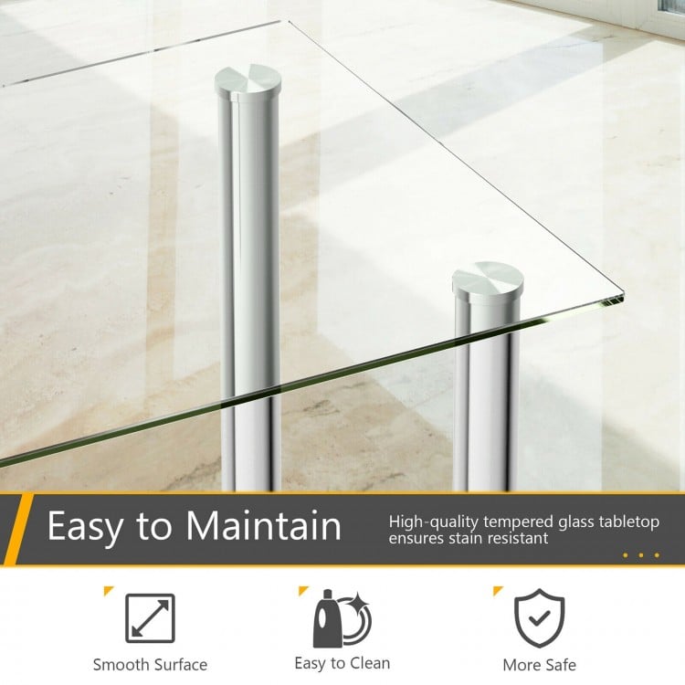 Dining set featuring a clear tempered glass tabletop and sturdy steel legs, perfect for modern dining rooms or kitchens.