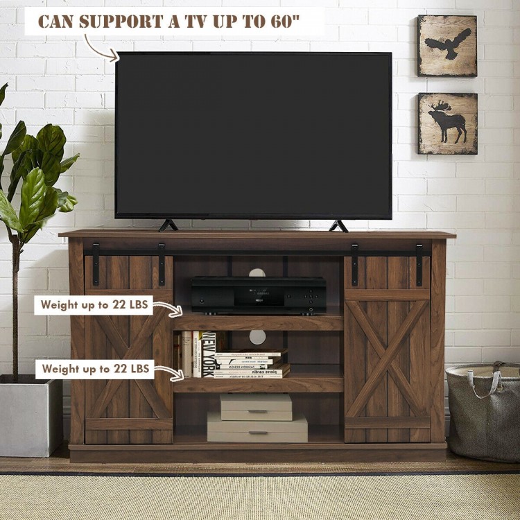 Sliding barn TV stand in brown with black metal rail, accommodates TVs up to 60", features rustic sliding doors.