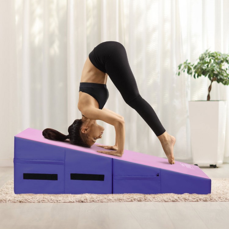 Folding wedge exercise gymnastics mat in purple, featuring high-density foam and handles for easy transport and storage.