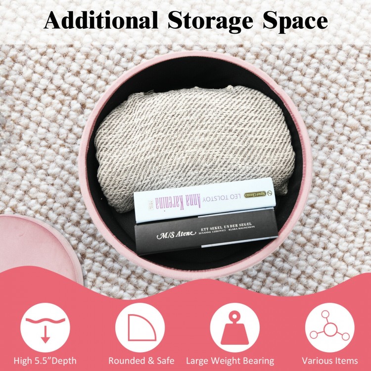Round pink velvet storage ottoman with metal legs, featuring interior space for organizing clothes and toys.