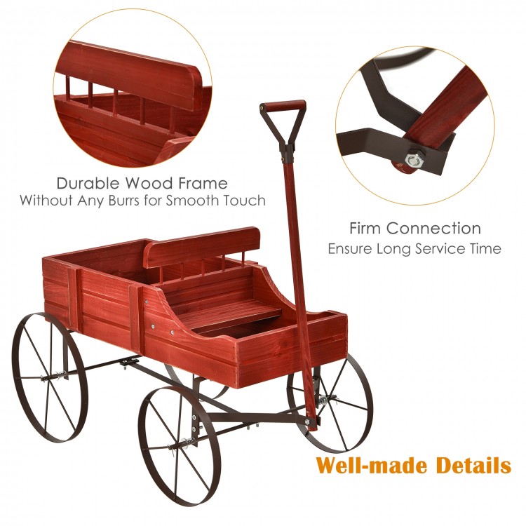 Red wooden wagon plant bed with metal wheels, featuring two planting sections for garden use and easy mobility.