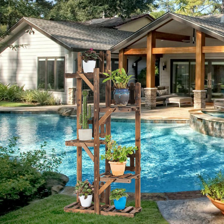 5-tier wood plant stand with triangular brackets, showcasing potted plants by a poolside for outdoor decor.