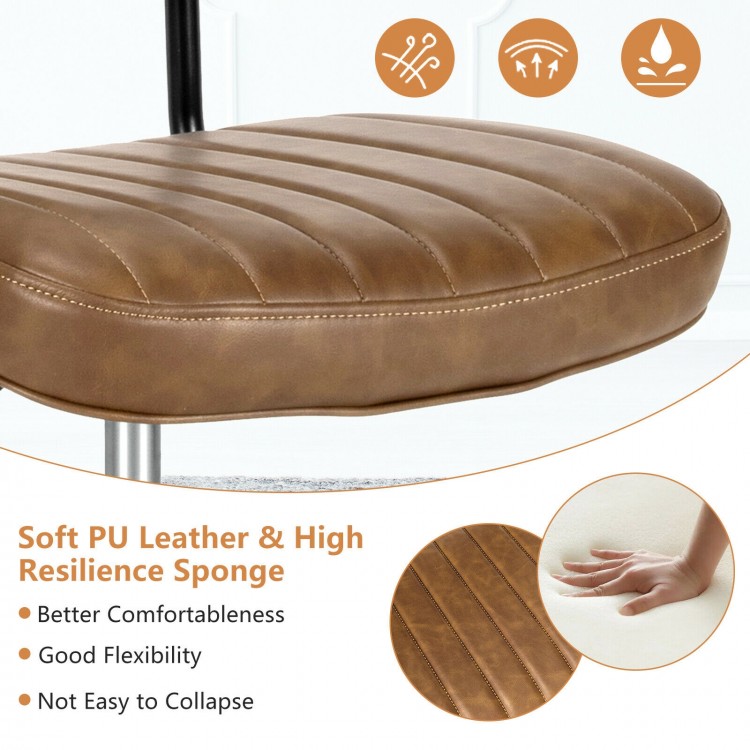 Close-up of the brown PU leather seat of an adjustable office chair, featuring a soft cushion and ribbed design for.