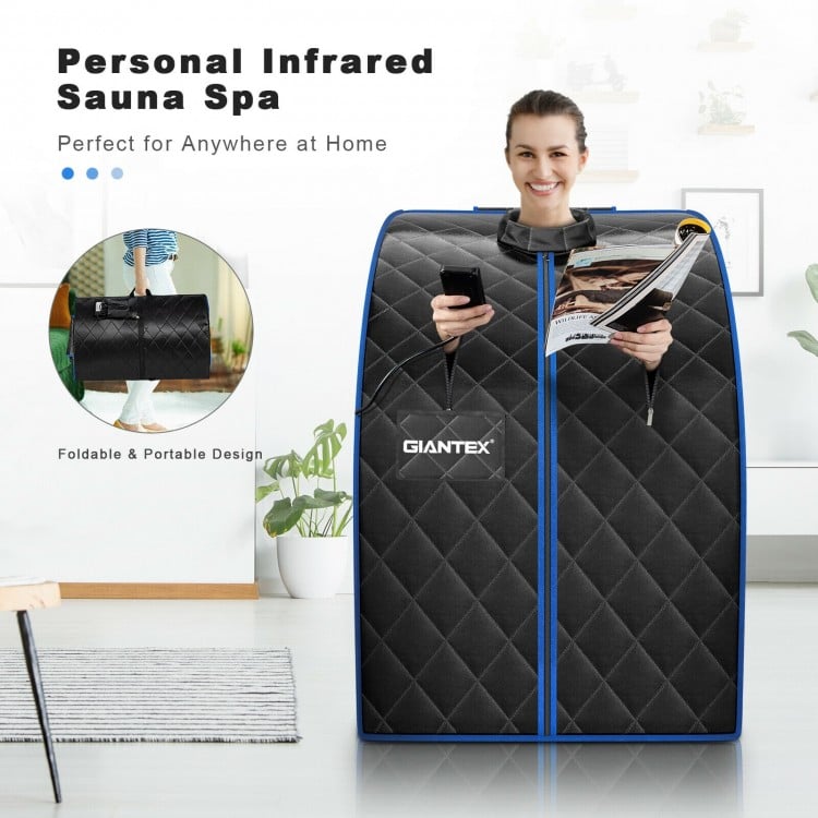 Portable personal far infrared sauna in black with foldable chair, heating foot pad, and LED control for home.