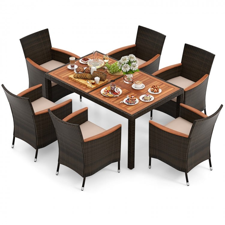 Elegant 7-piece garden dining patio rattan set with acacia wood table and cushioned chairs for outdoor enjoyment.