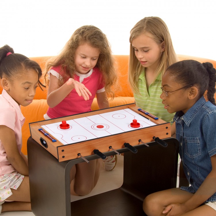 Kids enjoying the 2 in 1 In/Outdoor Air Hockey Foosball Game Table, featuring rotating surfaces for versatile play.