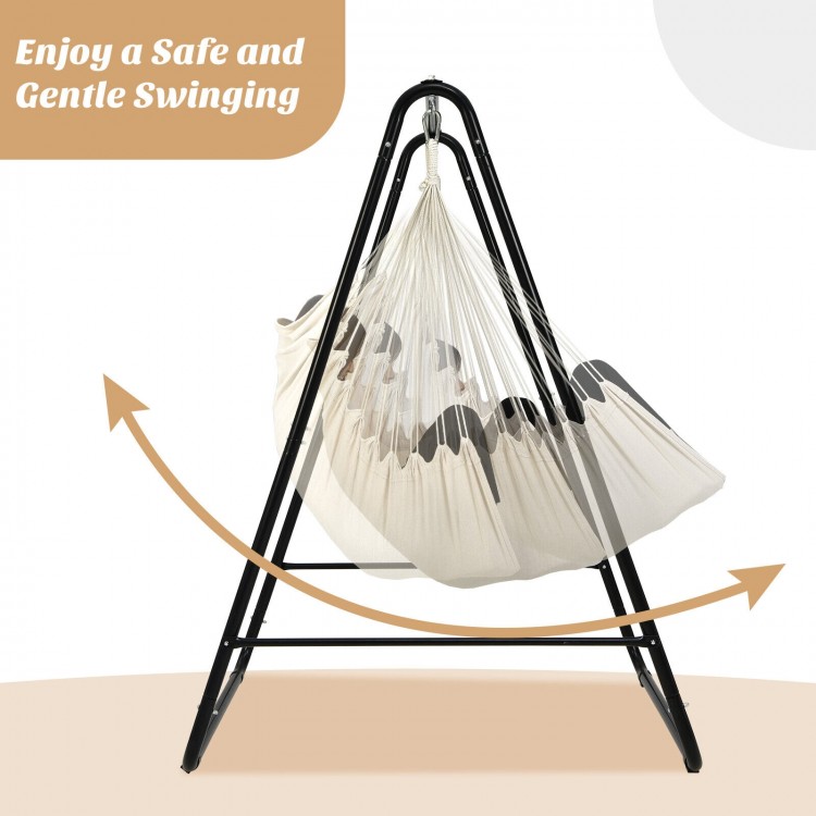 Hanging padded hammock chair with stand in beige, featuring a sturdy steel frame for safe indoor or outdoor swinging.