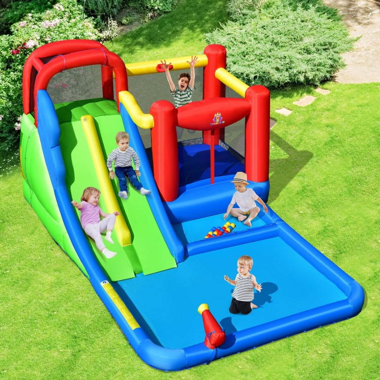 Inflatable water slide with climbing wall, basketball hoop, and ball pit for kids' outdoor summer fun.