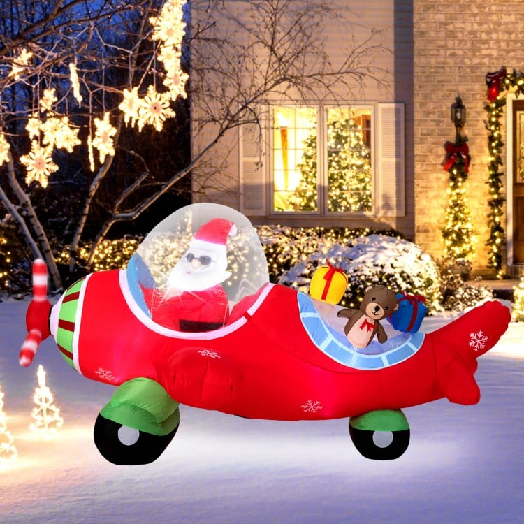 Inflatable 7.2 feet Christmas airplane with Santa, bear, and gift boxes, featuring built-in LED lights for outdoor.