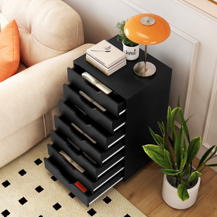 Top view of a 7-drawer black wooden storage dresser with lockable wheels, showcasing ample space for organization.