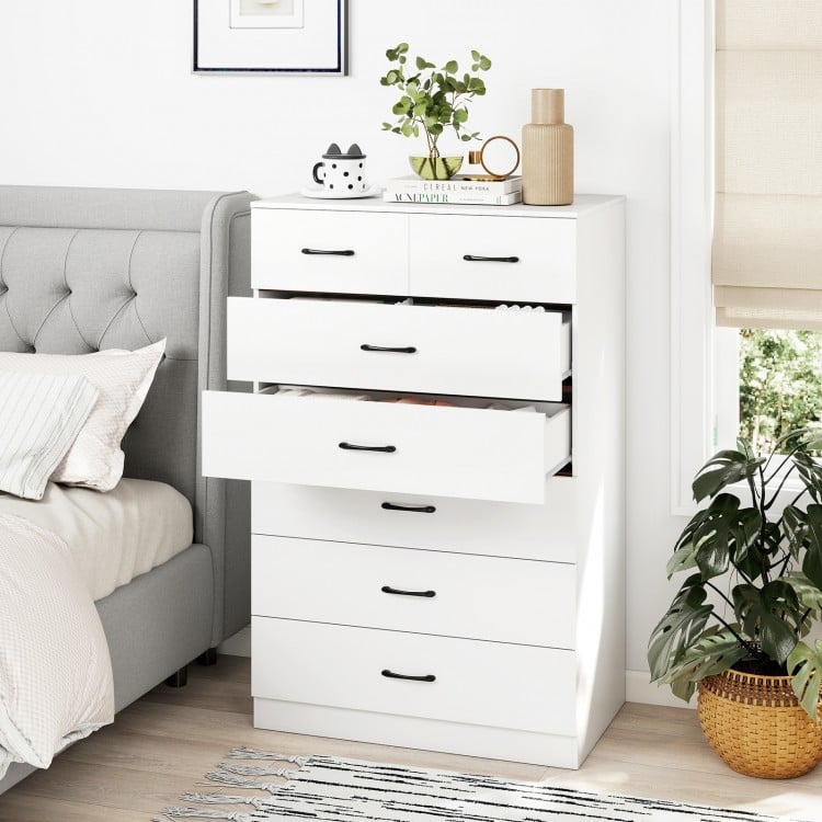 7-drawer tall dresser in white with metal handles, featuring a spacious top and anti-tipping kits for safety.