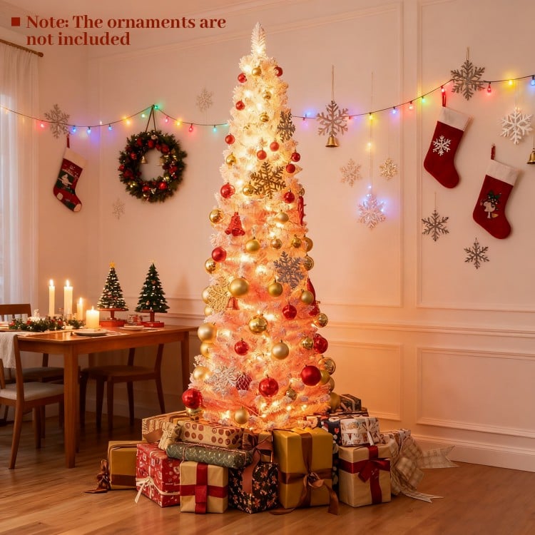 Snow-flocked 7 FT pink Christmas tree with warm white LED lights, perfect for holiday decoration in homes or cafes.