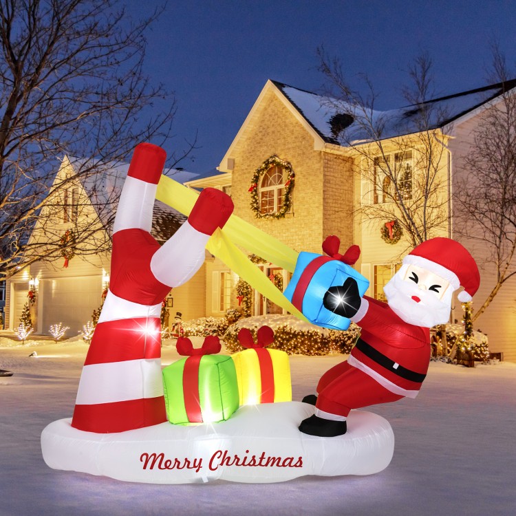 7-foot inflatable Santa with slingshot and LED lights, perfect for festive outdoor Christmas decorations.