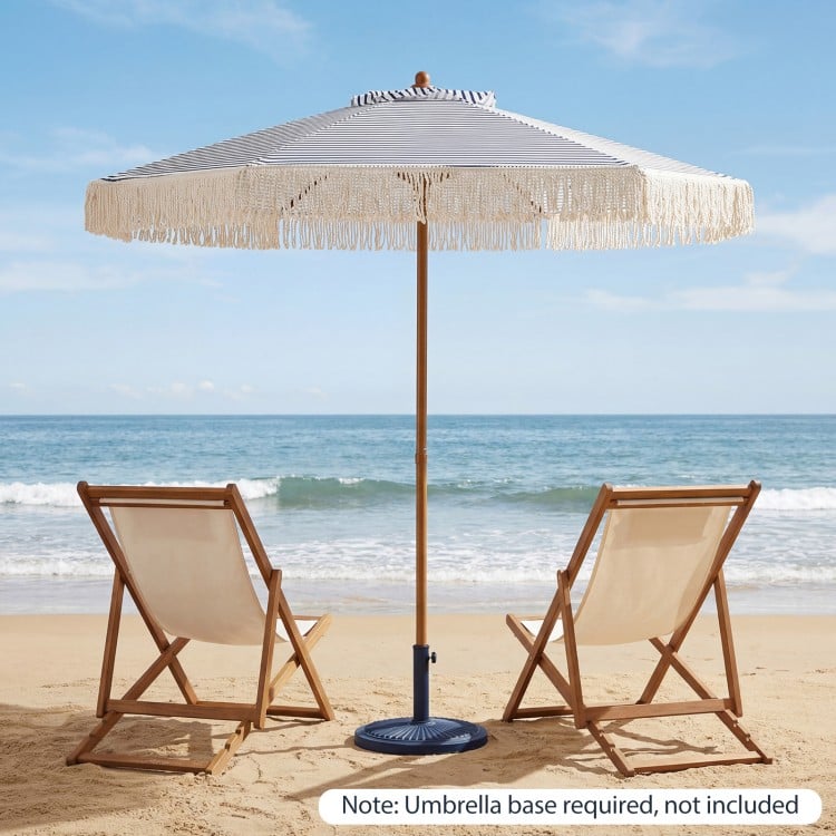 7 feet blue patio umbrella with fringe and tassels, featuring a sturdy aluminum pole, perfect for beach relaxation.