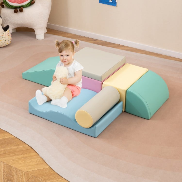 Colorful 7-piece soft play equipment set featuring foam climbing blocks for indoor play and creativity development.