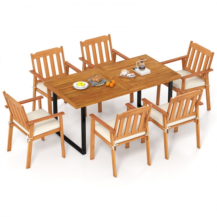 Top view of a 63” rectangular acacia wood dining table surrounded by six armchairs with removable cushions for outdoor.