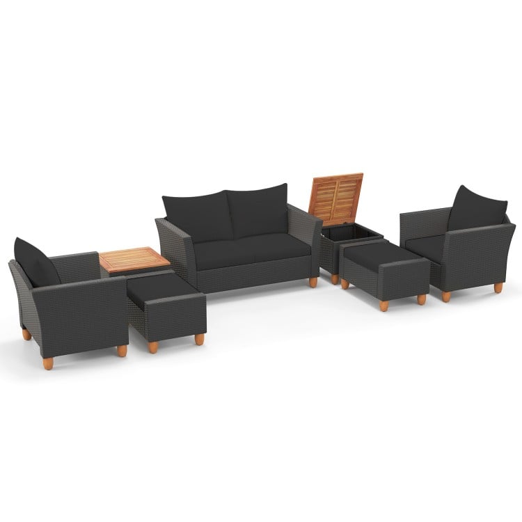 7-piece patio furniture set featuring black PE rattan sectional sofa, armchairs, and acacia wood side table with.