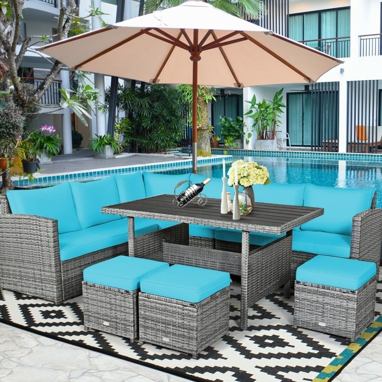 7-piece patio rattan dining set with turquoise cushions, including corner chairs, table, and ottomans for outdoor.