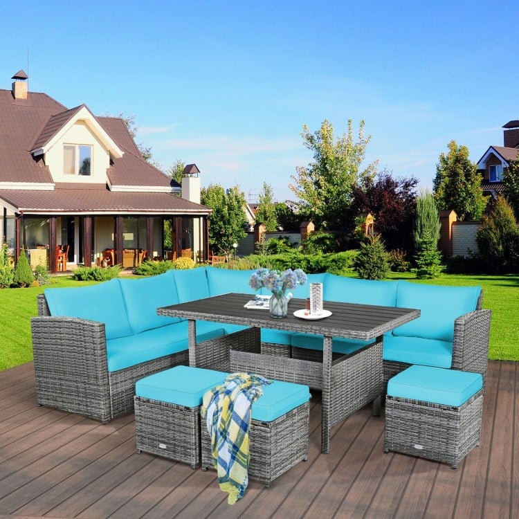 Turquoise cushion detail on a corner chair from a 7-piece patio rattan dining set, ideal for outdoor comfort.