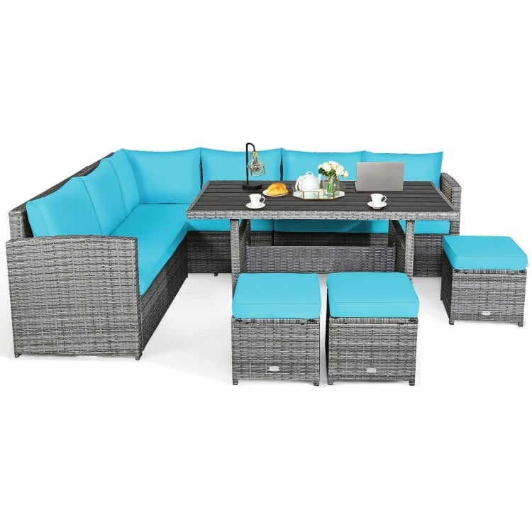 Close-up view of the woven texture of the 7-piece patio rattan dining set with turquoise cushions for outdoor elegance.