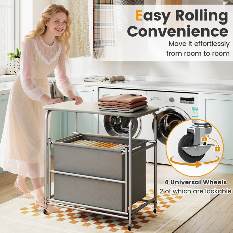 3-section laundry sorter with foldable ironing board, gray oxford baskets, and lockable wheels for easy mobility.