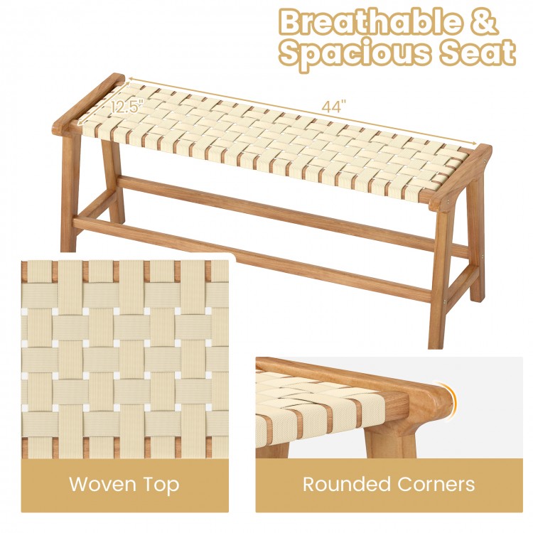 Teak wood patio bench with a woven seat, 47 inches long, featuring rounded corners for added comfort and style.