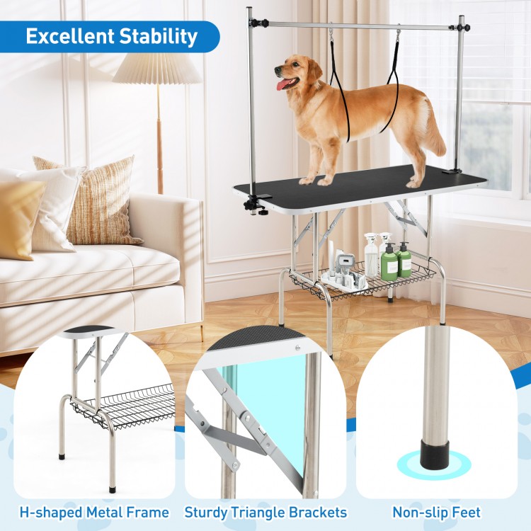 Foldable dog grooming table with height adjustable arms, sturdy metal frame, and non-slip surface for pet care.