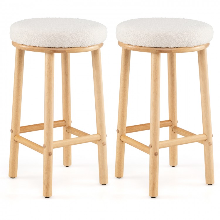 Set of 2 bar stools with boucle fabric seats and rubber wood frames, ideal for kitchen islands and dining areas.