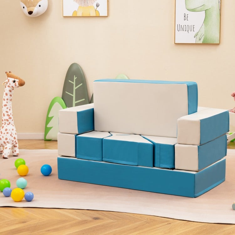 Colorful 4-in-1 foam playset in blue, designed as a sofa, cushion, and table for toddlers, lightweight and easy to.