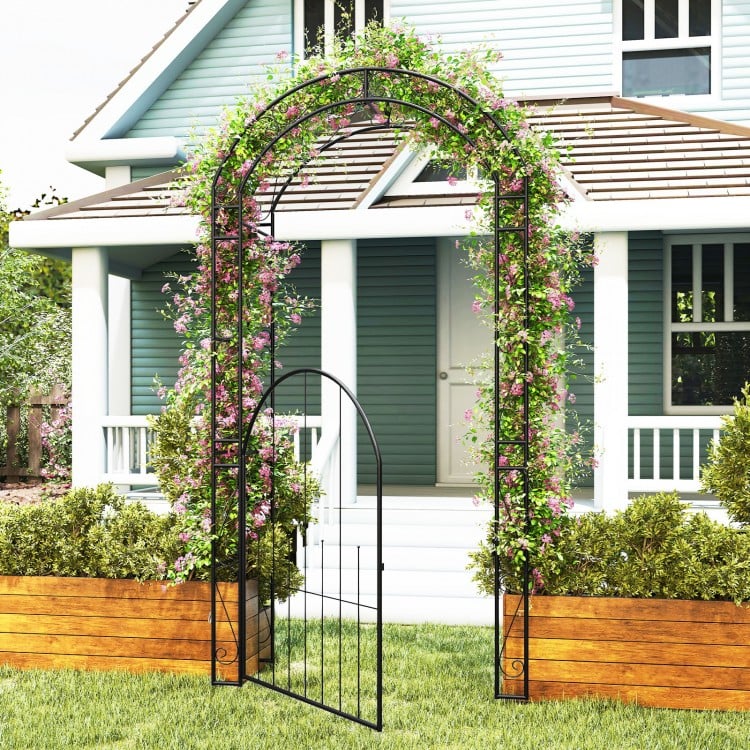 Metal garden arch with gate, featuring an arched design and climbing trellises, perfect for decorative outdoor.