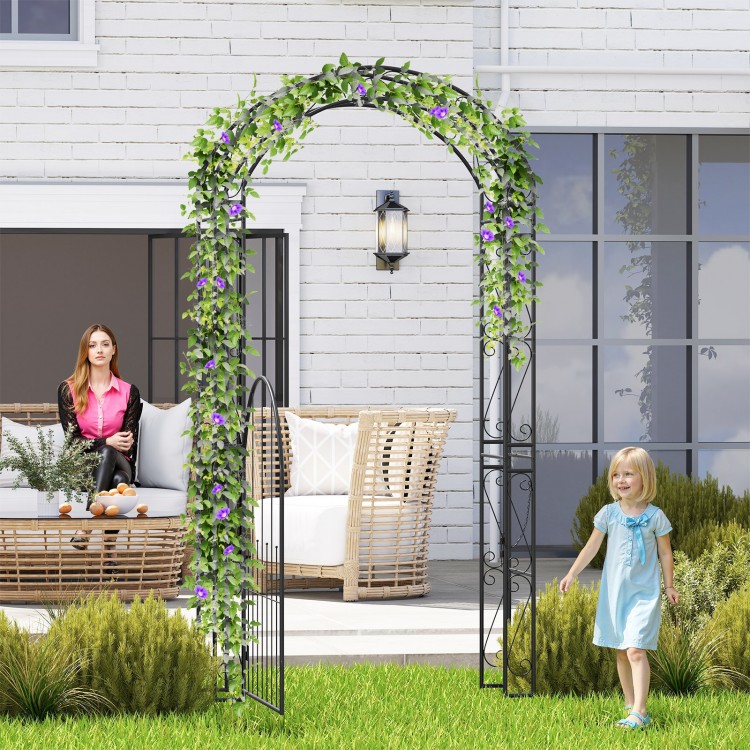 84-inch tall metal garden arch with gate, featuring elegant patterns and climbing trellises for plants, perfect for.