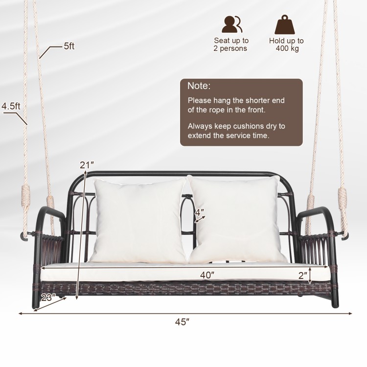 Wicker hanging porch swing with white cushions, 880 lbs capacity, ideal for outdoor relaxation on the porch or garden.