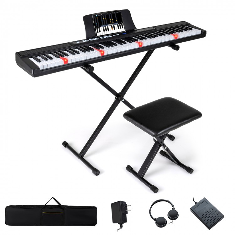 88-key electric piano keyboard with adjustable stand, stool, and portable bag, featuring light-up buttons and MIDI.