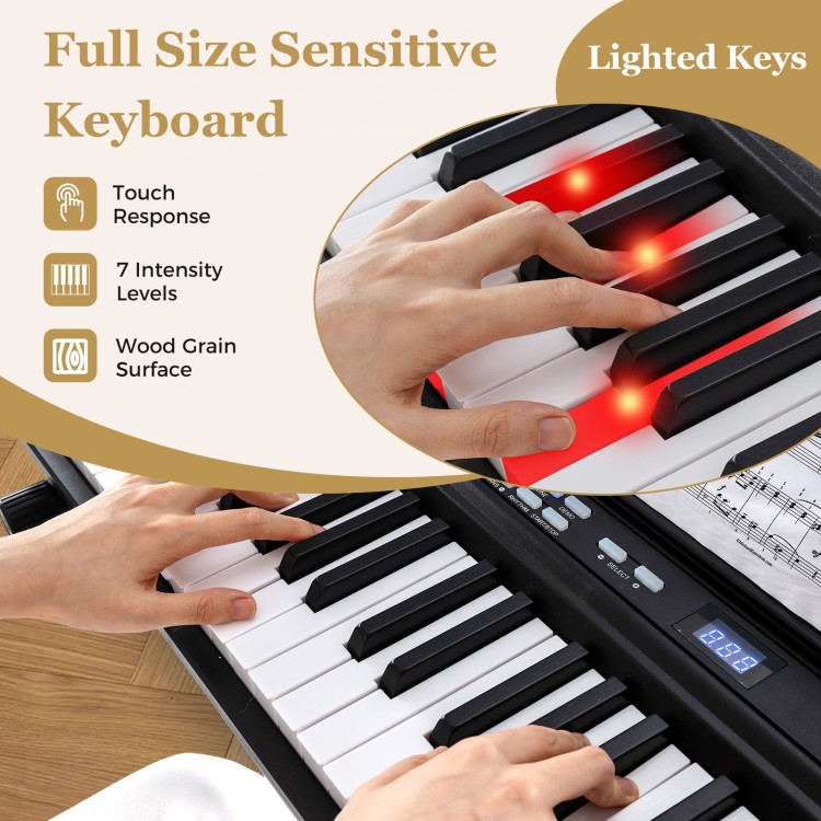 Full-size sensitive keyboard with lighted keys, featuring touch response and wood grain surface for enhanced.