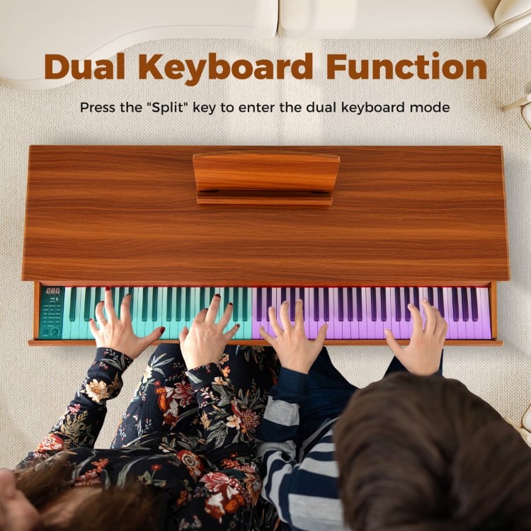 Dual keyboard view of the 88-key graded hammer action weighted keyboard in brown, ideal for two players.
