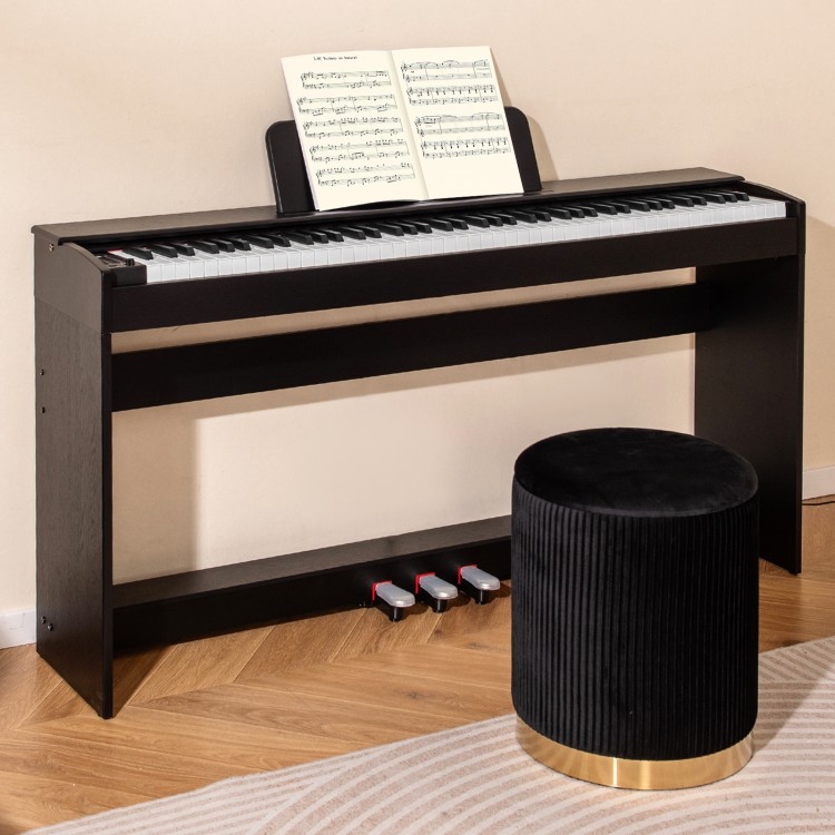 88-key weighted keyboard in black with furniture stand, triple pedals, and removable music stand for versatile playing.