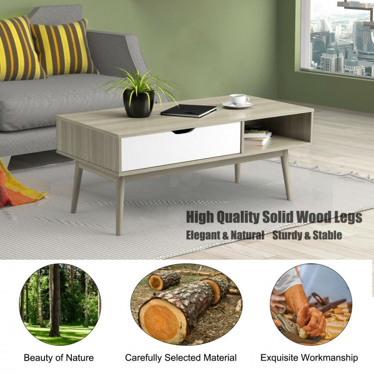 Coffee cocktail accent table in gray with drawer and open shelves, featuring solid wood legs for stability and stylish.