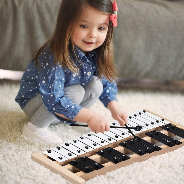 Child playing the 27 Note Glockenspiel Xylophone with rubber mallets, featuring a sturdy wood frame for musical.