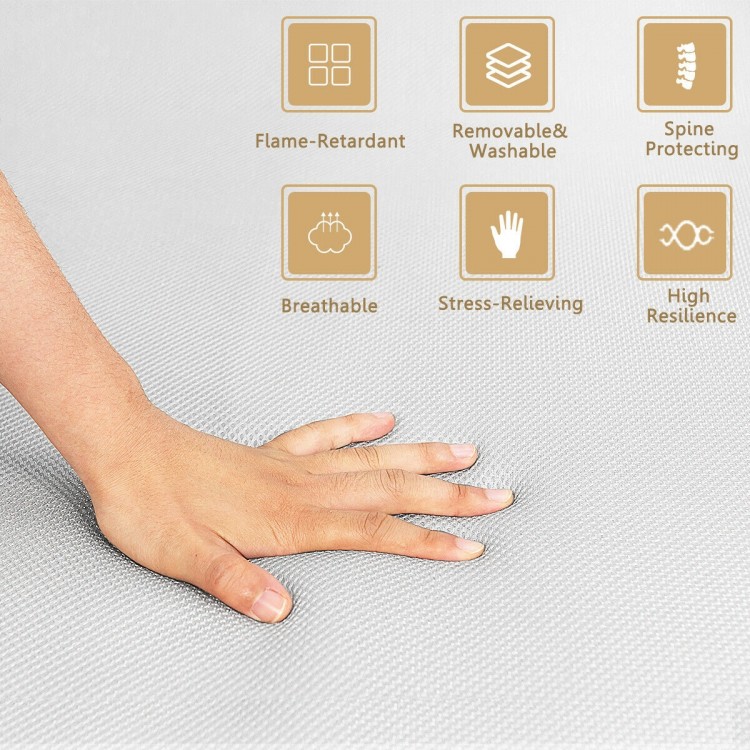 4-inch folding sofa bed foam mattress with a hand pressing on the breathable, stress-relieving surface for comfort.