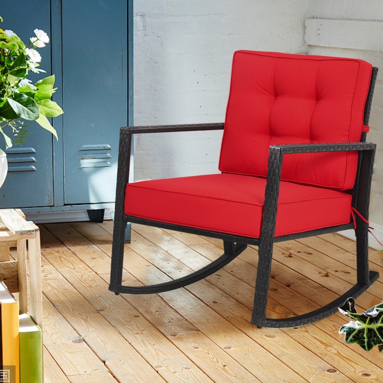 Rustic-style red rocking chair with thick cushions and sturdy PE rattan, ideal for cozy indoor or outdoor lounging.